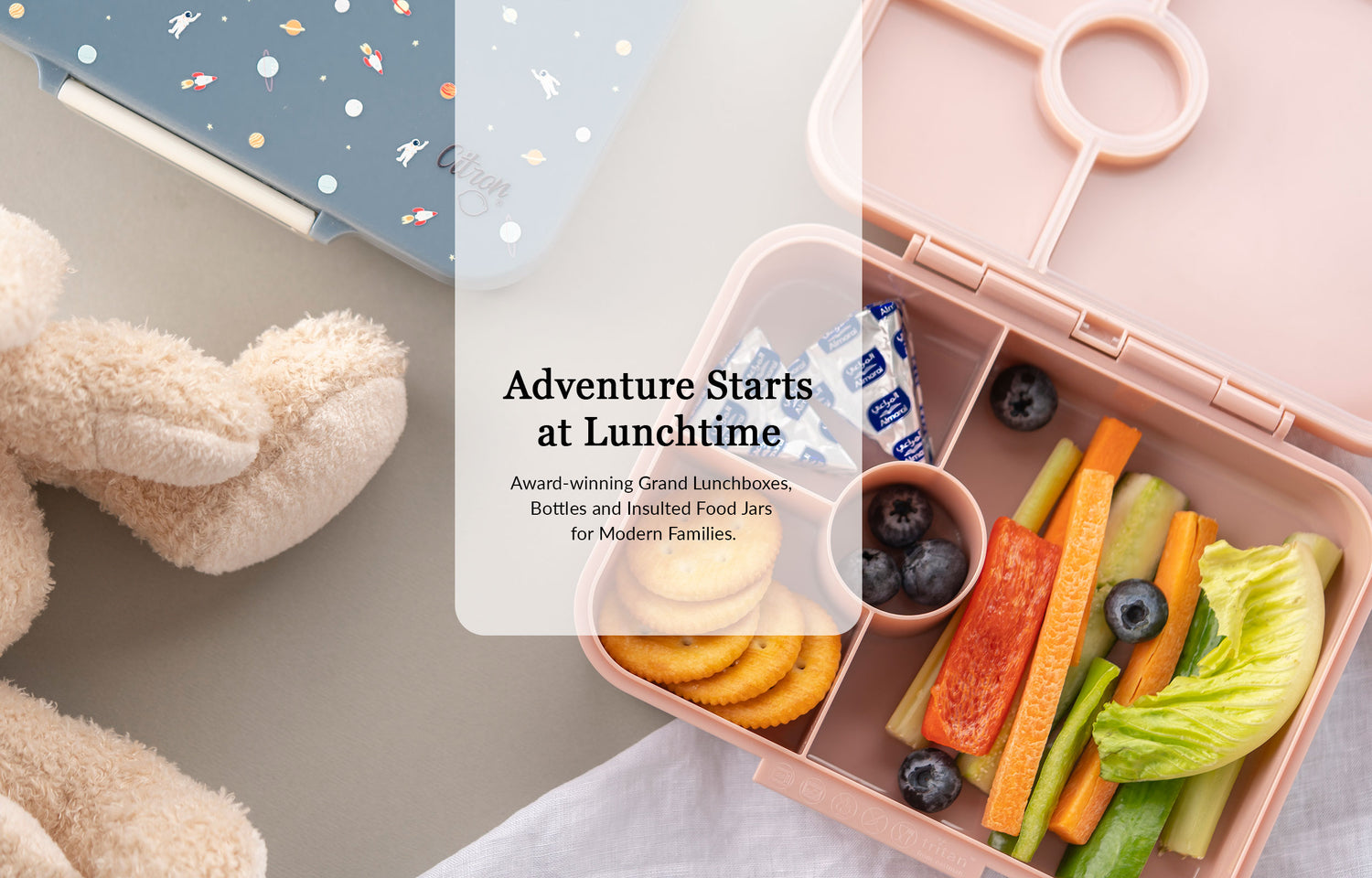 Citron Grand Lunch Box with fresh fruit, vegetables and snacks for school lunches, daycare, travel and everyday family adventures. BPA-free, leak-resistant lunchbox designed to keep meals fresh and organised.